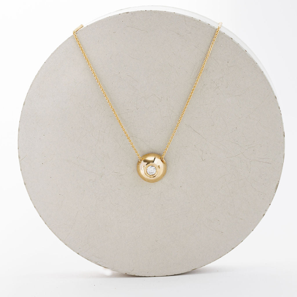 Solid gold hot sale round pendant