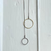 Steel and Brass Circles Lariat