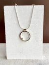 Silver Circle And Topaz Pendant